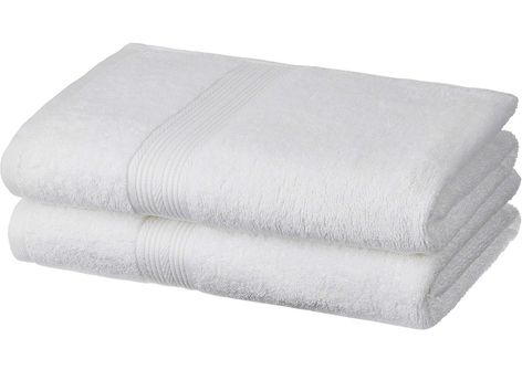Folded white bath towels